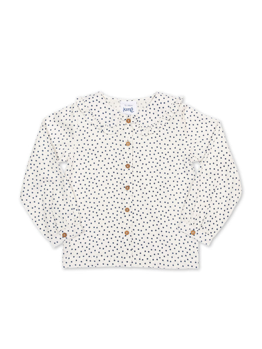 Blusa Dolly de algodón orgánico, estampado de lunares azul marino, cuello tipo muñeca y botones de coco.