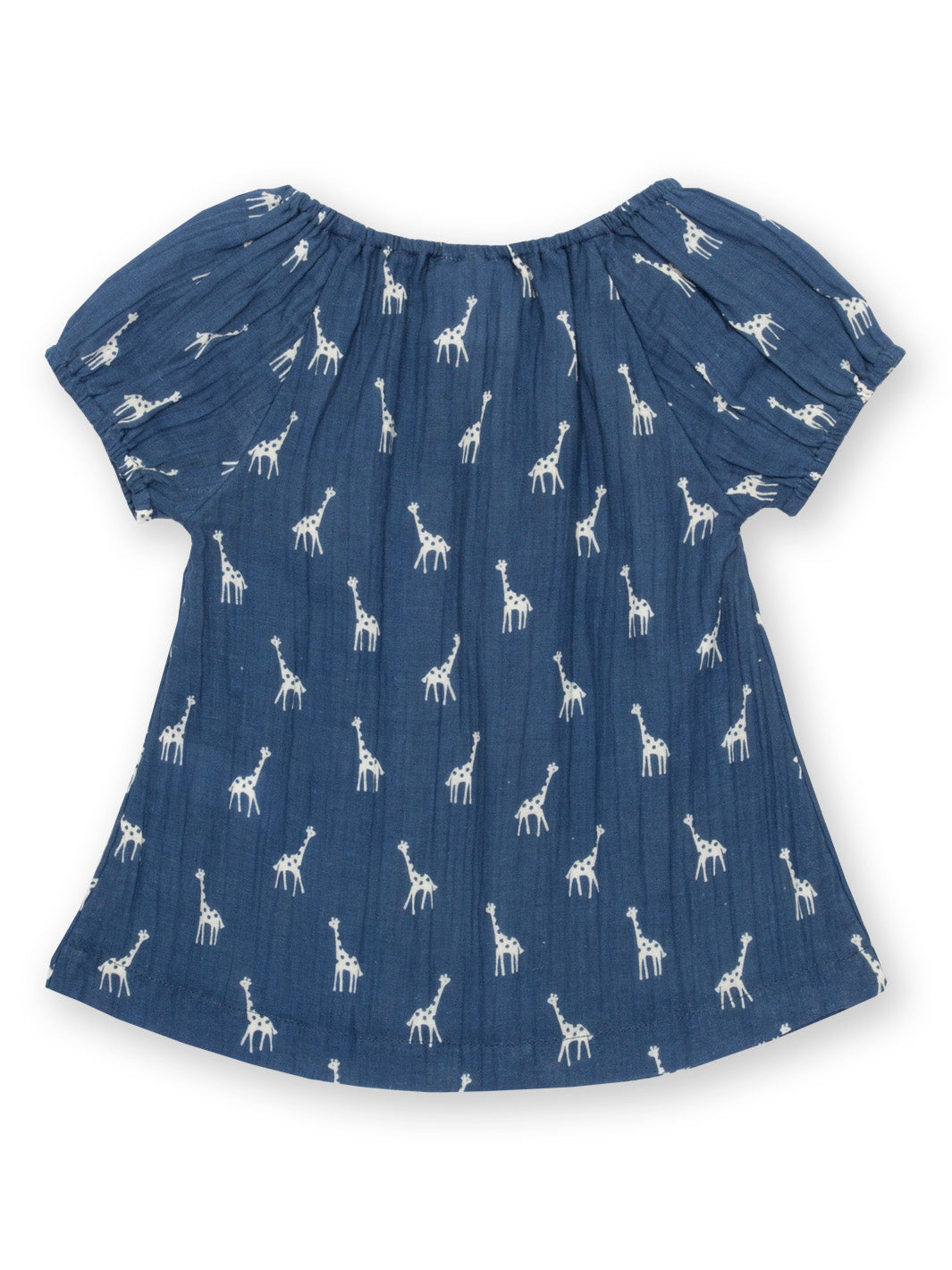 Vista trasera de la Blusa Lunares de Jirafitas de algodón orgánico, con muselina de doble capa y ajuste cómodo.