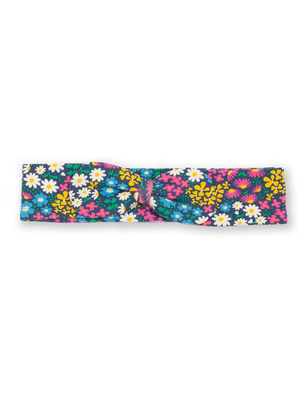 Cintillo de algodón orgánico con estampado de flores en tonos suaves y lazo decorativo en el centro, ideal para complementar cualquier conjunto infantil.