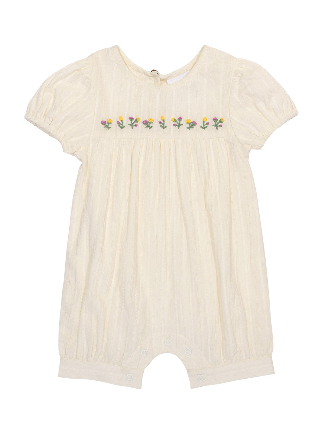 Enterito Pequeño Brote de algodón orgánico, color crema con bordado de flores y mangas fruncidas.