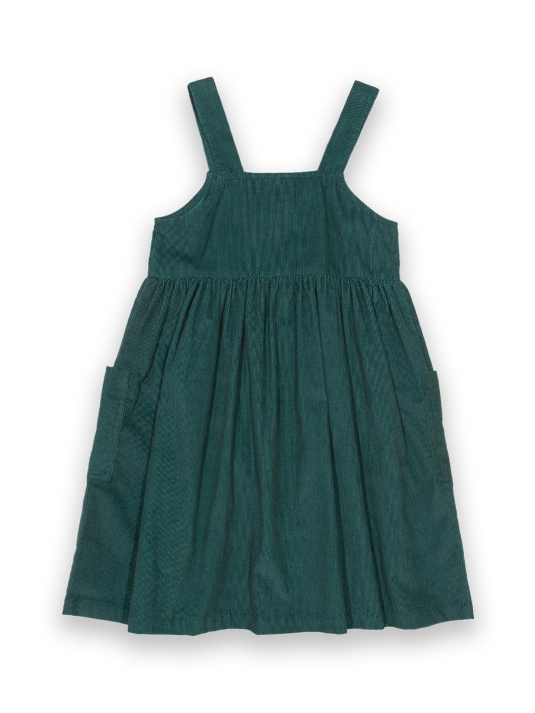 Parte trasera de jardinera de cotelé verde pino con tirantes anchos y acabado limpio, ideal para combinar con poleras y tops de temporada.
