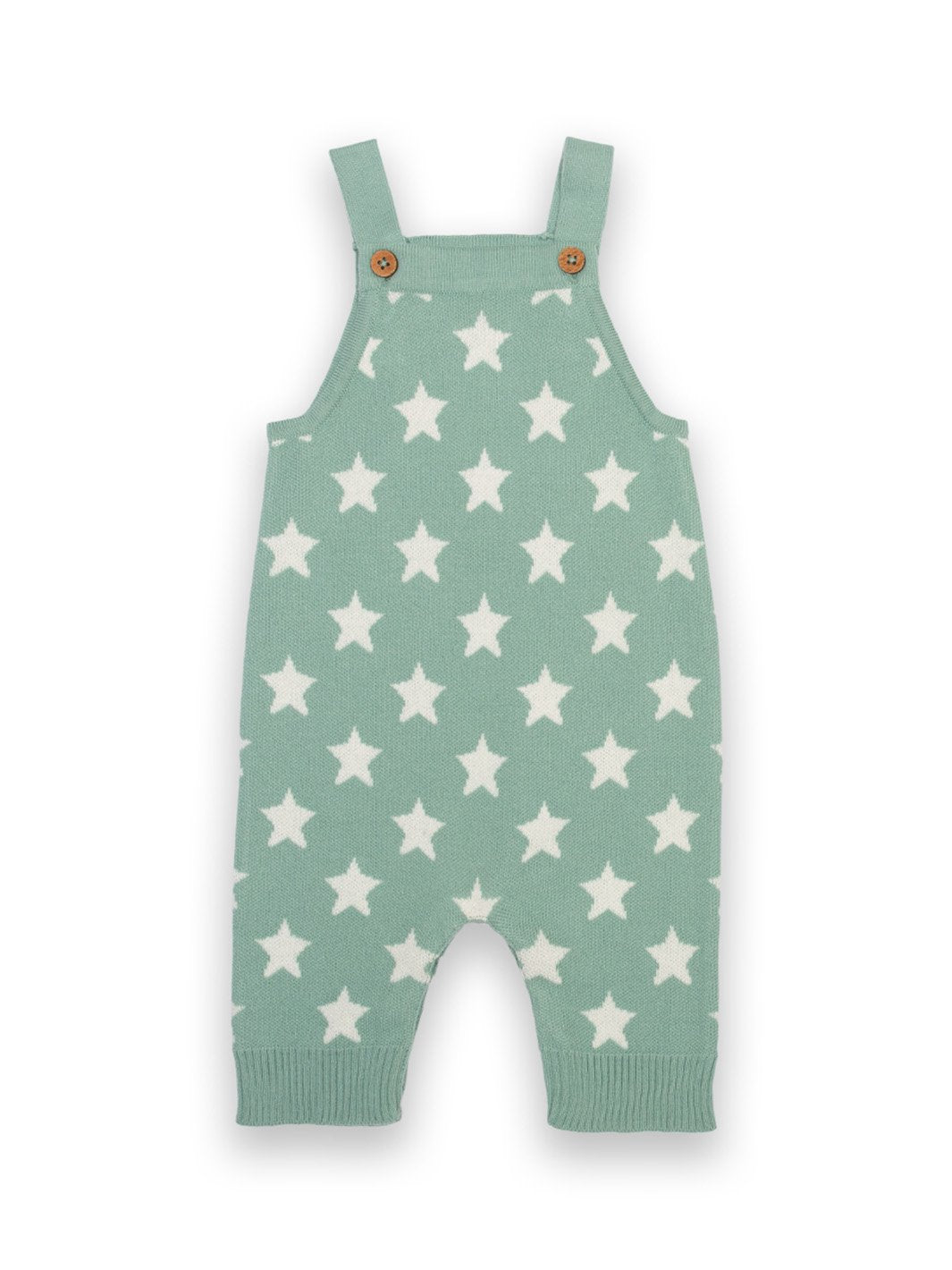 Jardinera tejida de algodón orgánico en color verde abeto con diseño de estrellas en jacquard crema, tirantes ajustables con botones de coco y apertura en la entrepierna.