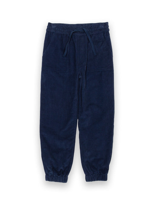 Pantalones de cotelé en azul marino medianoche, con cintura elástica y bolsillos tipo parche, diseñados para brindar comodidad y calidez.