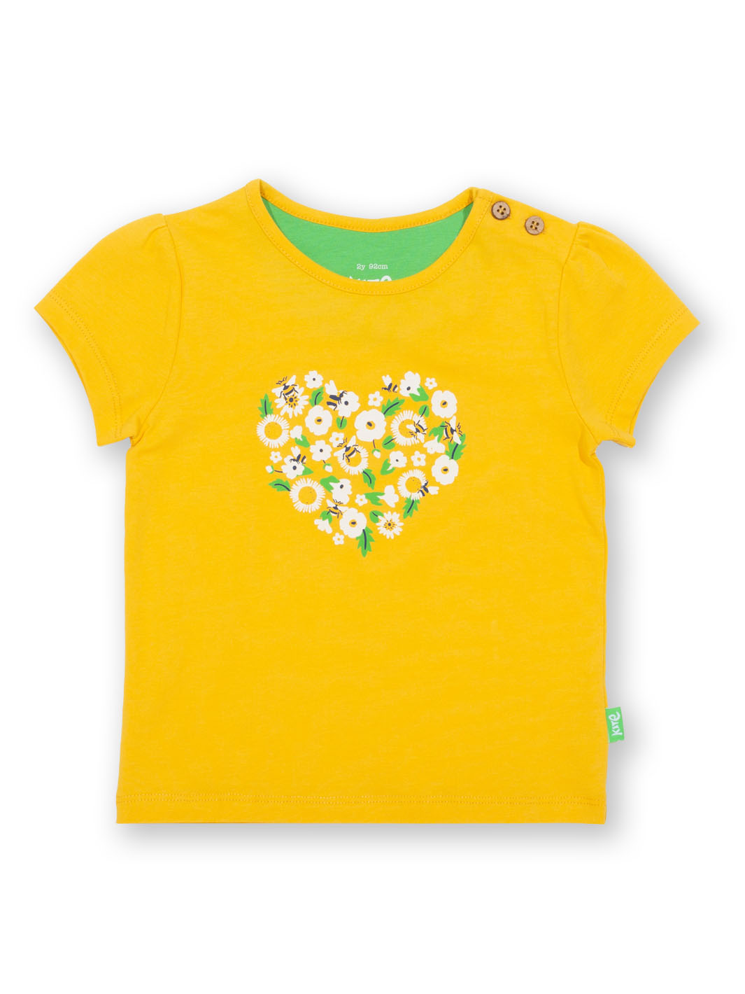 Polera Corazón Floral de algodón orgánico color amarillo con estampado de flores y abejorros.
