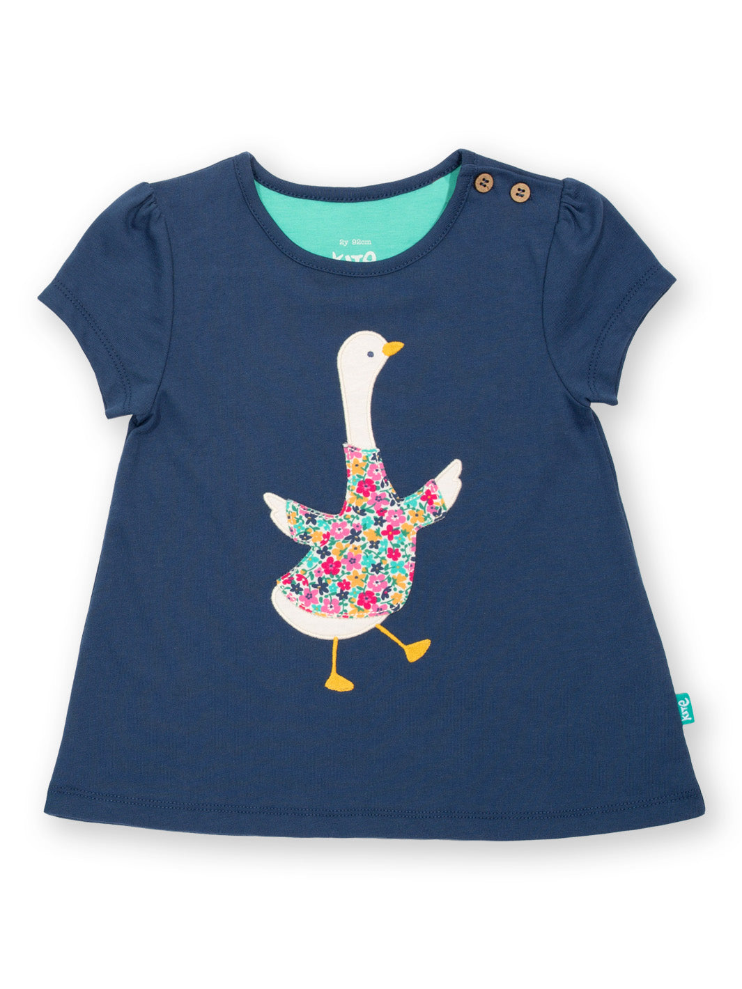 Polera Gansito Floral de algodón orgánico, azul marino con aplique de ganso y estilo túnica.