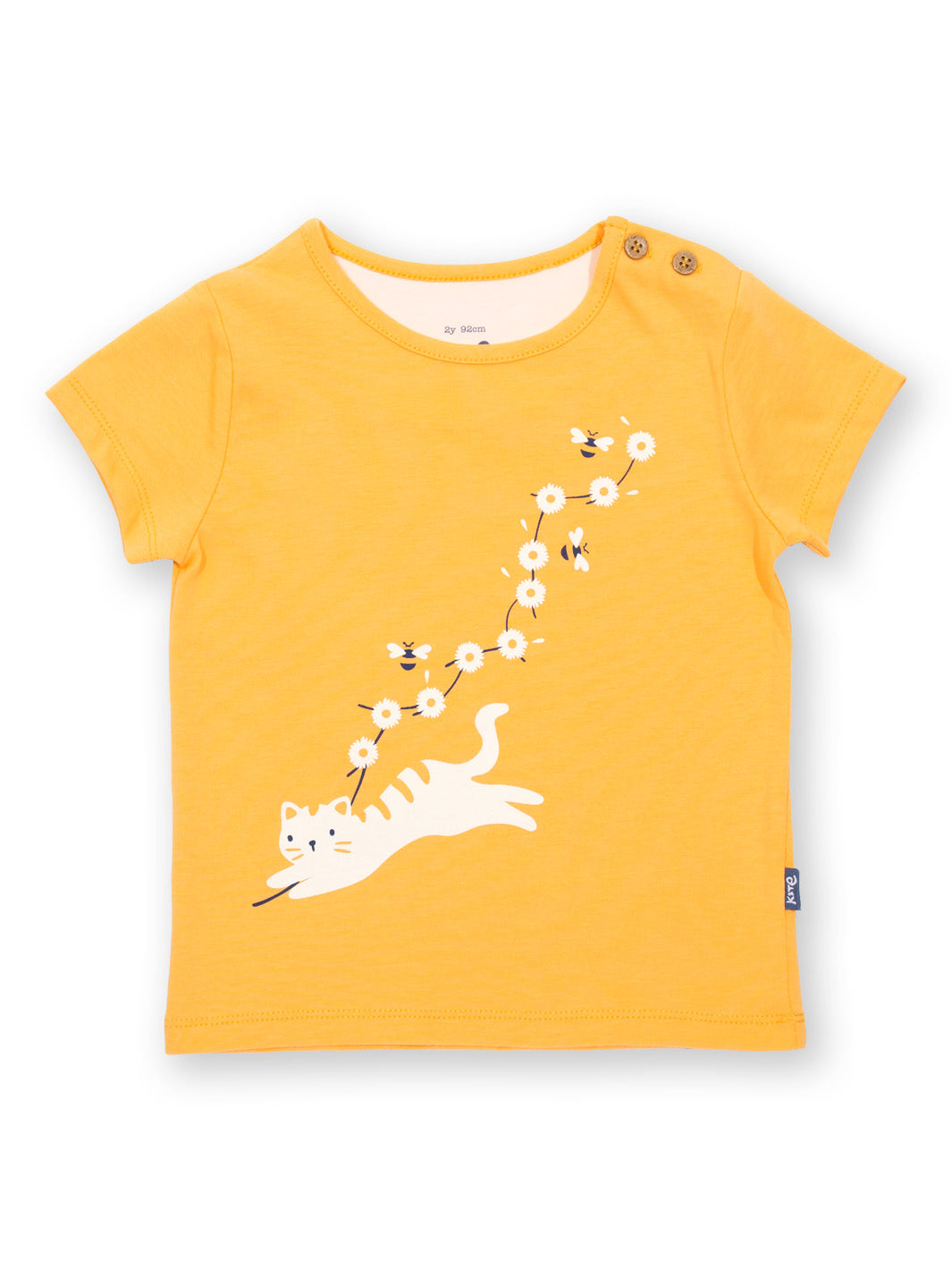Polera Pequeño Gatito de algodón orgánico, color amarillo cálido con estampado de gato y manga corta.