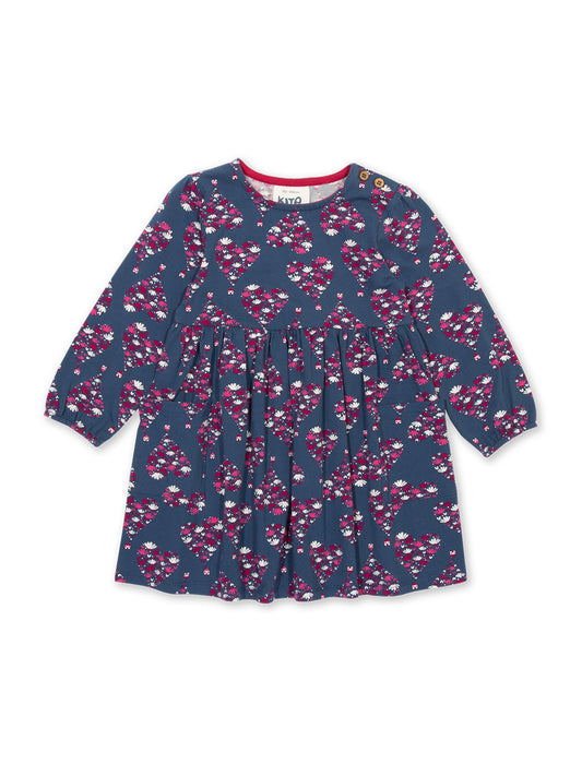 Vestido Dulce Hogar de algodón orgánico, con estampado "No hay como el hogar" y bolsillos de parche.