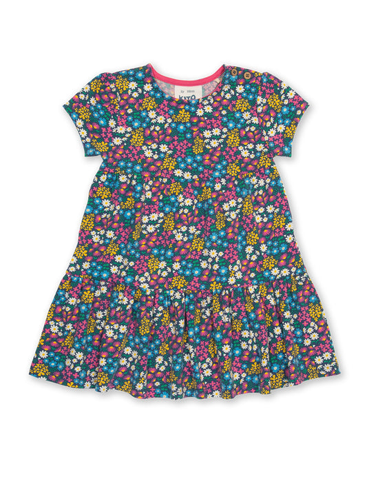 Vestido Jardín de Flores de algodón orgánico, con estampado floral y falda en capas.