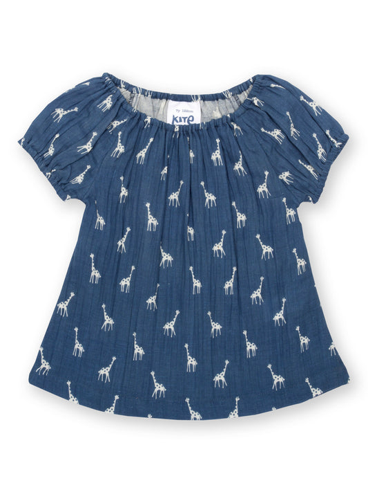 Blusa Lunares de Jirafitas de algodón orgánico en azul marino, con estampado de jirafas y escote elástico.