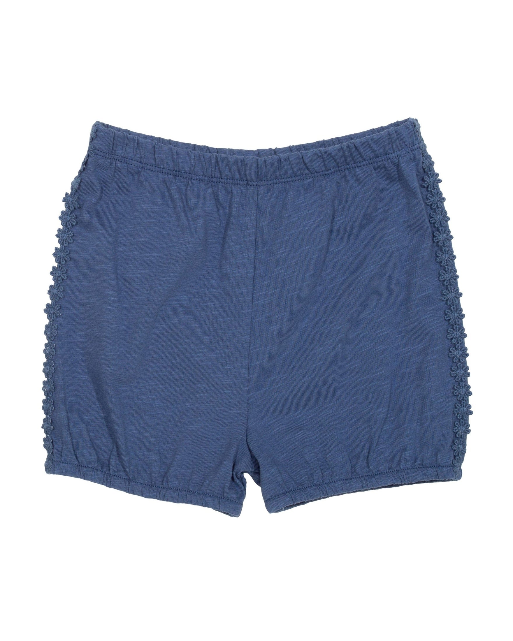 Short Burbuja de algodón orgánico, color azul con ribete de margaritas y cintura elástica.