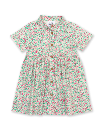 Vestido Pequeño Brote de algodón orgánico, estilo camisero con botones de coco y falda completa.